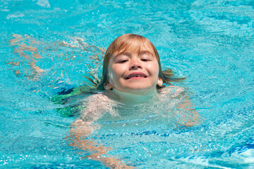 Fototapeta na wymiar Child in swimming pool. Summer kids activity. Summer vacation. Healthy kids lifestyle.