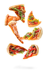 Flying slices of tasty pizzas on white background