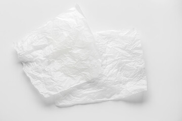 Sheets of baking paper on white background