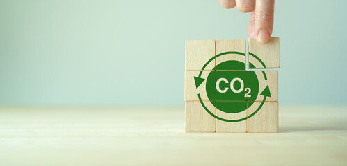 Carbon neutrality concept. Green business transformation and commitment for balancing between emitting carbon and absorbing carbon from the atmosphere. Climate change,environment and carbon management - obrazy, fototapety, plakaty