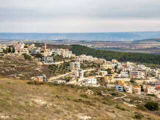 Fototapeta na wymiar Arab villages at its foot, neighborhood Nazareth, Israel