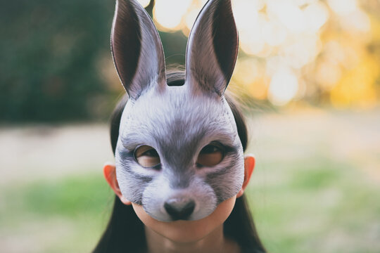 portrait of a girl with a rabbit mask
