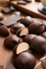 Delicious bird's milk candies on board, closeup