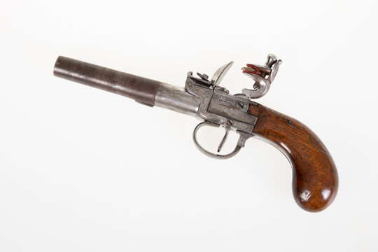 Nineteenth century handgun weapon vintage gun on white background