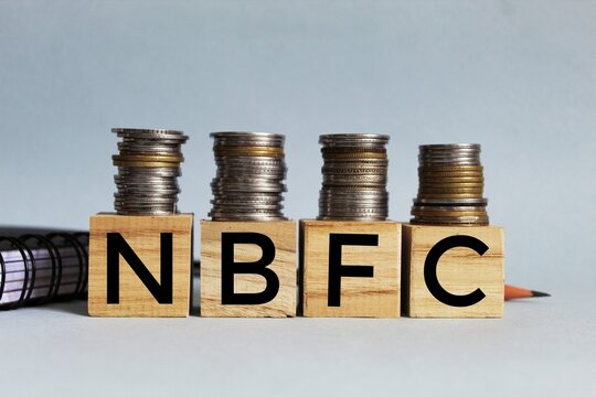 NBFC concept, Non Banking Financial Company concept, NBFC in wooden block.