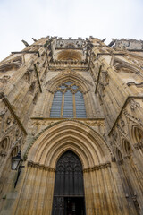 Fototapeta na wymiar York Minster , Roman Catholic Gothic church and cathedral in York old town during winter snow at York , United Kingdom : 2 March 2018