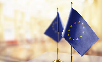 Small national flag of the European Union on a black background