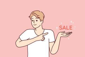 Fototapeta na wymiar Positive man pointing finger at inscription sale, inviting for profitable shopping in supermarket or online store. Optimistic guy dressed in casual t-shirt for marketing campaign. Flat vector design 