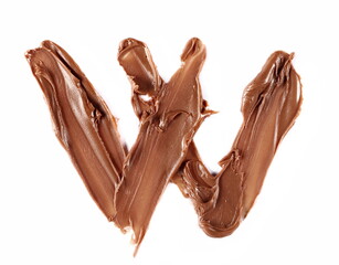 Cream chocolate spreading in shape letter W, alphabet isolated on white, clipping path, top view