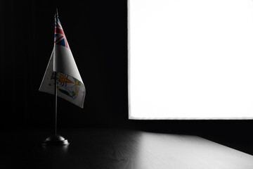 Small national flag of the British Antarctic Territory on a black background