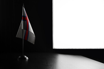 Small national flag of the Faroe Islands on a black background