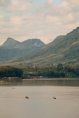 Beautiful wallpaper mekong river in Laos and Thailand. Roundtrip Asia. In the background the nature of Luang Prabang