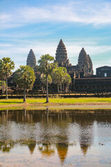 Travel to the beautiful Angkor Wat in Siem Reap in Cambodia. Trees and Temple. Asia Roundtrip (Buddha)