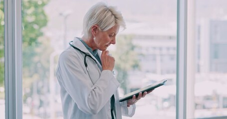Tablet, thinking or doctor working on research or data analysis for a healthcare solution in a hospital. Innovation, life insurance or senior woman planning or problem solving in medical office room - Powered by Adobe