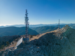 dominance fire watchtower and signal emitters at mountain peak