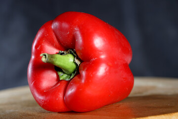 sweet red pepper on a dark background