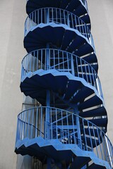 View of modern metal empty fire escape ladder near building outdoors, closeup