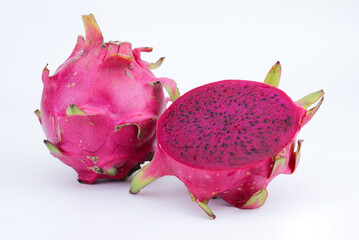 close-up of sliced red dragon fruit isolated on white background