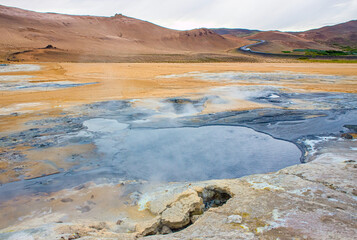 Hverir , Iceland geothermal area at the Namafjall volcanic mountain. Hverir is also known as...