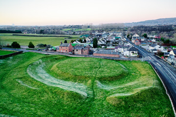 Neolithic henge monument known as King Arthurs Round Table. Eamont Bridge, Cumbria, England. Hoar...