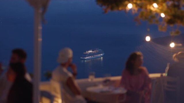 Cruise ship seen from a restaurant in Santorini, Greece