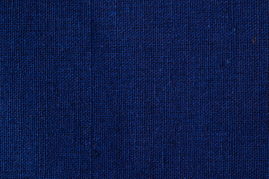 Dark blue color fabric cloth polyester texture and textile background.