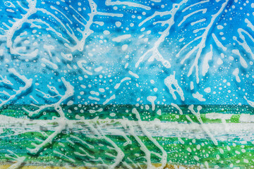 Soap foam on glass- cleaning of contaminated surfaces. Clean background- clipart photo