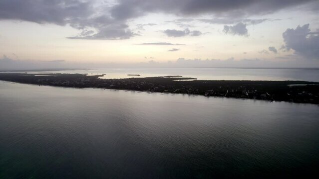 Drone view of twilight sky over the beach Water island. sea stock clips.