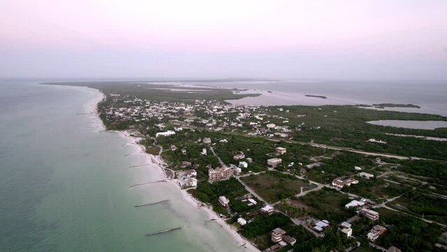 Drone view of settlement over the beach Water island. ocean stock clips
