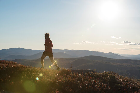 Trail runner high in the mountains of New Hampshire.