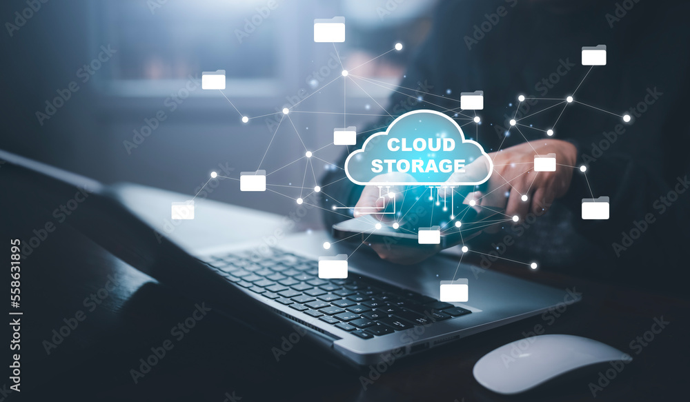 Poster businessman hand holding smartphone and laptop with cloud computing diagram show on hand. cloud tech