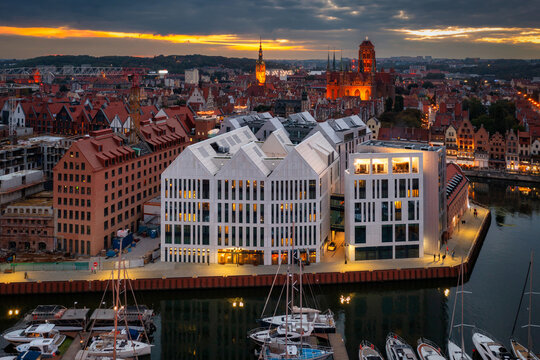 Old town in Gdansk with the Granaries Island by the Motlawa river at dusk, Poland.