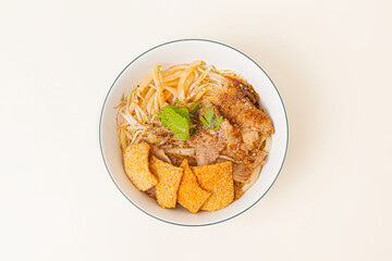 Cao Lau Hoi An, Vietnamese rice noodle with pork, Vietnamese food isolated on white background, top view