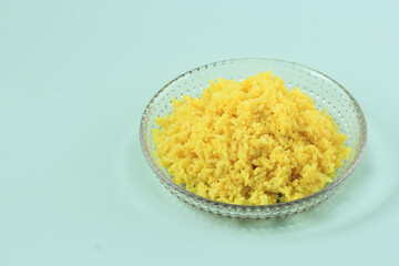 Nasi Kuning or Yellow Rice, Typical Indonesian Food. made from Rice Cooked with Turmeric,