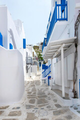 Mykonos, Greece. View of the narrow streets of the town with white and blue houses
