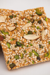 Pista Badam Gajak Patti Or Tilgul Papdi Chikki Gazak Or Gachak Bar Made Of Crushed Sesame Seeds, Roasted In Ghee With Jaggery, Gur, Almonds, Kaju, Gud Is Enjoyed In Winter On Makar Sankranti And Lohri