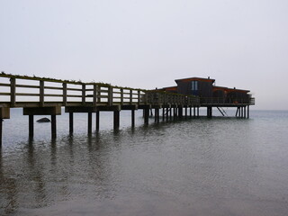 Fototapeta premium Wood bridge and sauna on the Kattegat sea.