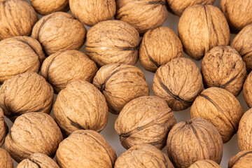Walnut in shell isolated on white background. Energy boost for the day. The concept of proper nutrition. Tasty breakfast.