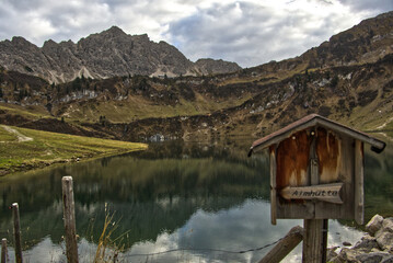 Traualpsee lake Tannheimer valley with surrounding buildings 