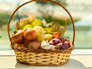 basket of vegetables in front of the beach
