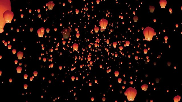 Many lanterns floating in the night sky in 4k animation. Many flying lanterns in the night sky.