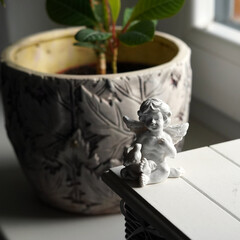 Little angel figurine. Photos from the interior.