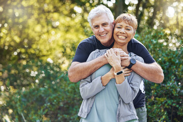 Nature, love and man hugging his wife with care, happiness and affection while on an outdoor walk. Happy, romance and portrait of a senior couple in retirement embracing in the forest, woods or park.