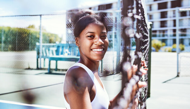 Fitness, Fence Or Portrait Of Black Woman On A Tennis Court Relaxing On Training, Exercise Or Workout Break In Summer. Happy, Sports Athlete Or Healthy African Girl Ready To Play A Fun Match Or Game