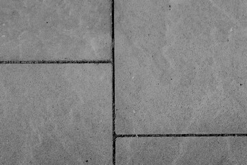Fototapeta premium gray stone slabs with joints as flooring