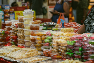  Indian assorted sweets or mithai for sale during Deepavali or Diwali festival at the market.