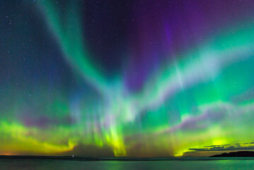 Northern lights over the sea. Österbotten/Pohjanmaa, Finland