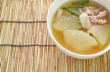 boiled winter melon with chicken meat soup on bowl