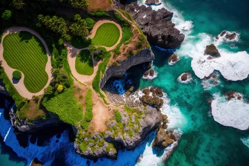 Foto op Aluminium Aerial view of a stunning golf course on a lush, rocky clifftop in a posh tourist destination on Indonesia's paradise island of Bali. In the pristine blue water, swimmers and surfers alike are active © 2rogan