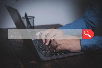 Searching browsing internet data information with blank search bar. Businessman use laptop,...
